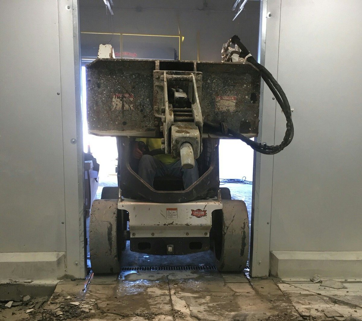 Now that is a tight fit! #bobcat #demolition #construction #bobcatbreaker #skidsteer #rjalleninc