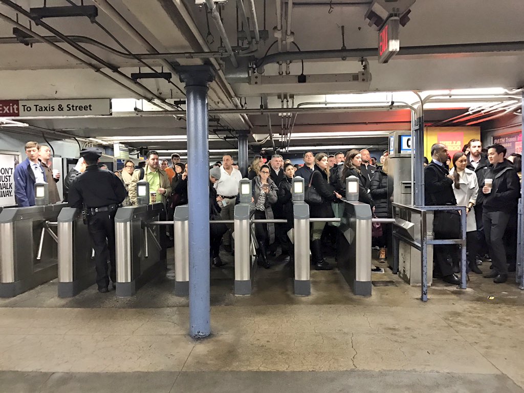 jenn_rosenthal's tweet photo. Police controlling the number of people going in and out of #Hoboken #PathTrains. Expect to never leave NJ. @NJtransit https://t.co/GcZXQhW4QH