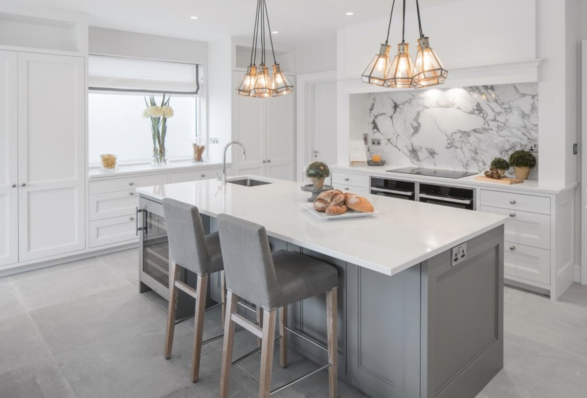 Pendant lighting and marble splashback make a statement in this chic traditional grey <a href="/TheInteriorsPro/">TheInteriorsProject</a> kitchen. po.st/Tp3Vp1
