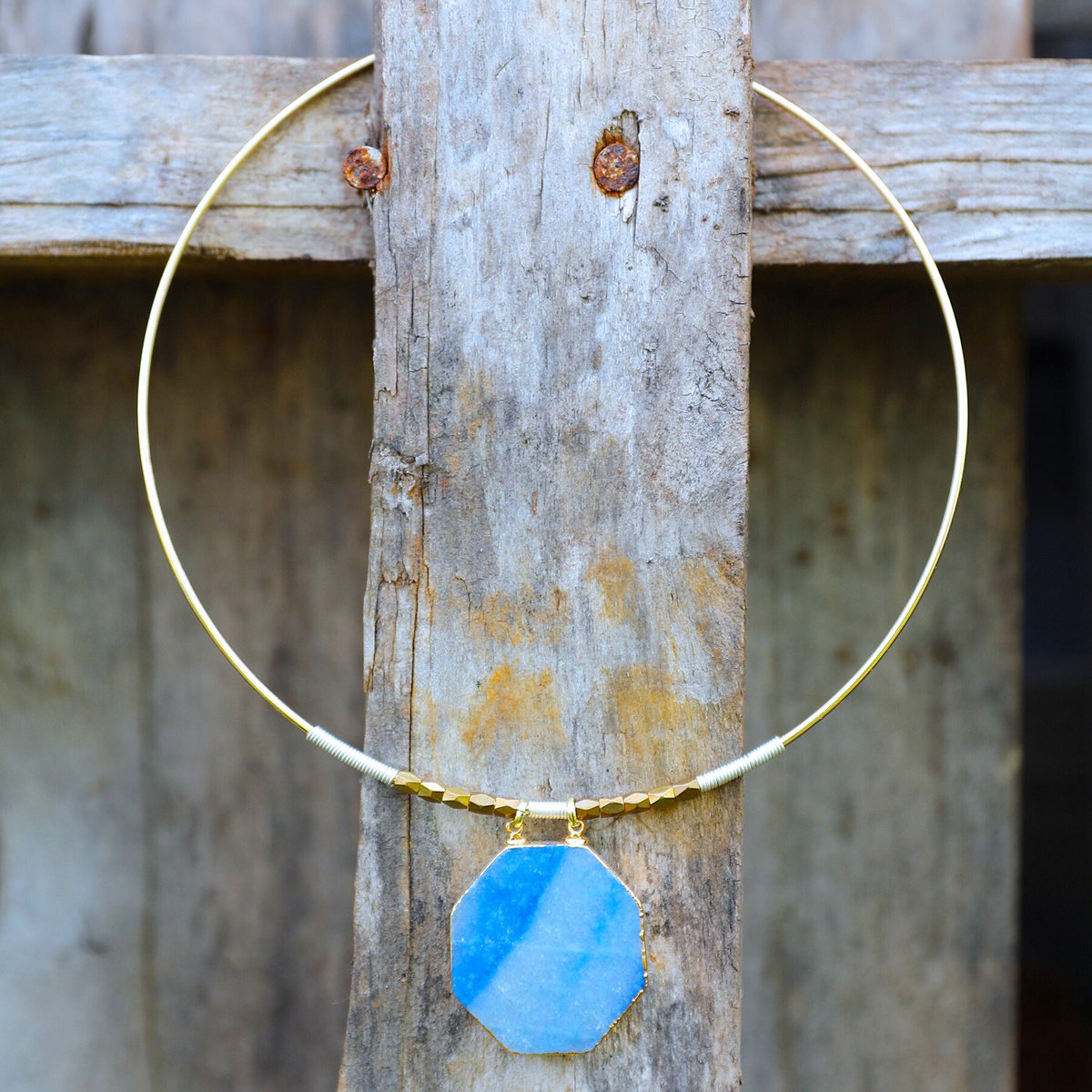 JFYbrand's tweet photo. 🌀Wrapped wire details sit so cozy 💕next 2 complimentary sparkly✨blue🦋, &amp; gold!!🔱 #shoplocal #knoxville 
#genuinestones #wrappedwire #jewelry https://t.co/cAFzrijak1