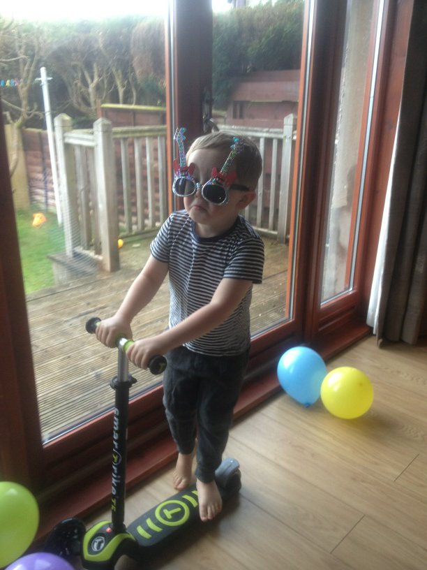 And a happy fourth birthday to the youngest of the trio, our James, seen here earlier as Elton John. 