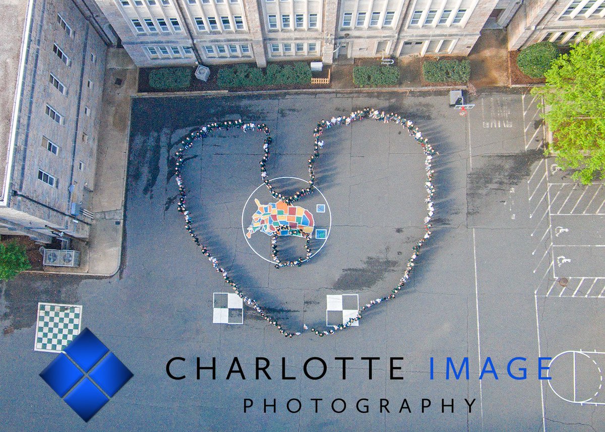 This aerial portrait of the students at Saint Patrick's Catholic School was captured as a gift to their principle.  #aerialphotography