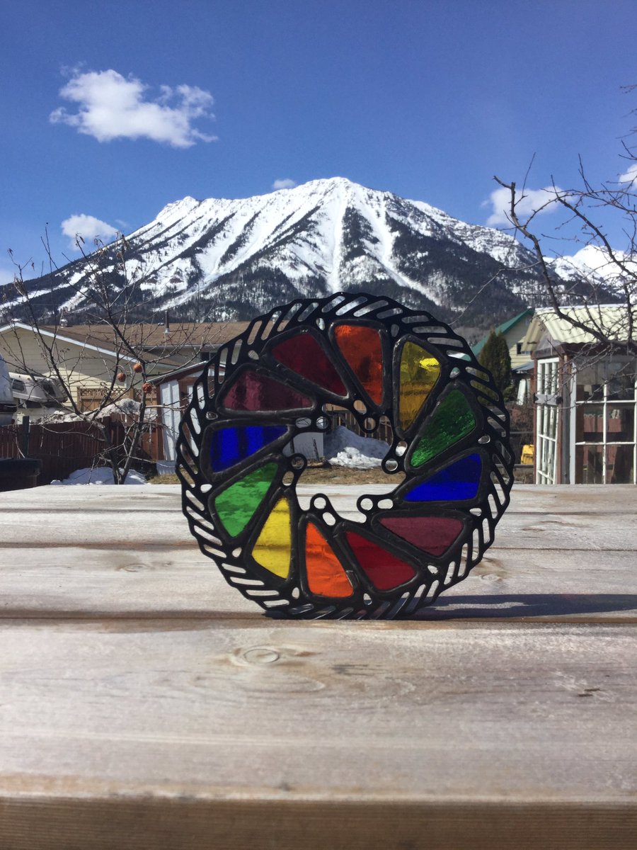 HappySpoke's tweet photo. Holy Spokes, it's nice out! Enjoy the Sunshine with these brand new rainbow pieces. Order now. (scenery not included) #HappySpoke #SeeHappy https://t.co/RgY6Y7Dzgf