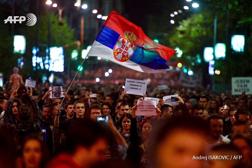 iandrej's tweet photo. Thousands protested in several Serbian cities against outgoing PM Aleksandar Vucic's weekend election next president. @AFPphoto #Serbia https://t.co/RLW0Wuk1Bw