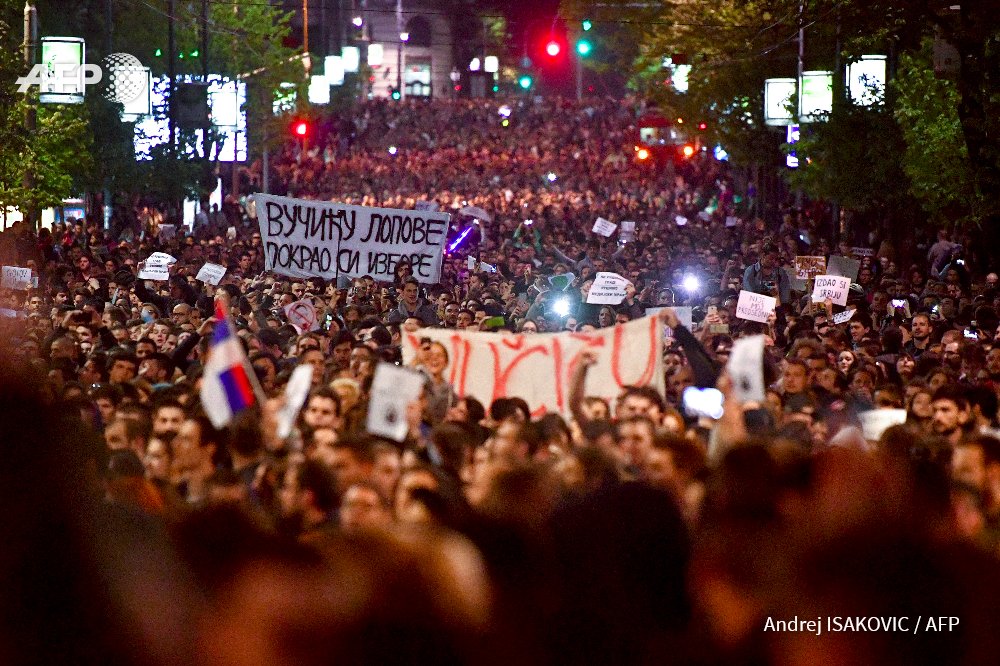 iandrej's tweet photo. Thousands protested in several Serbian cities against outgoing PM Aleksandar Vucic's weekend election next president. @AFPphoto #Serbia https://t.co/RLW0Wuk1Bw