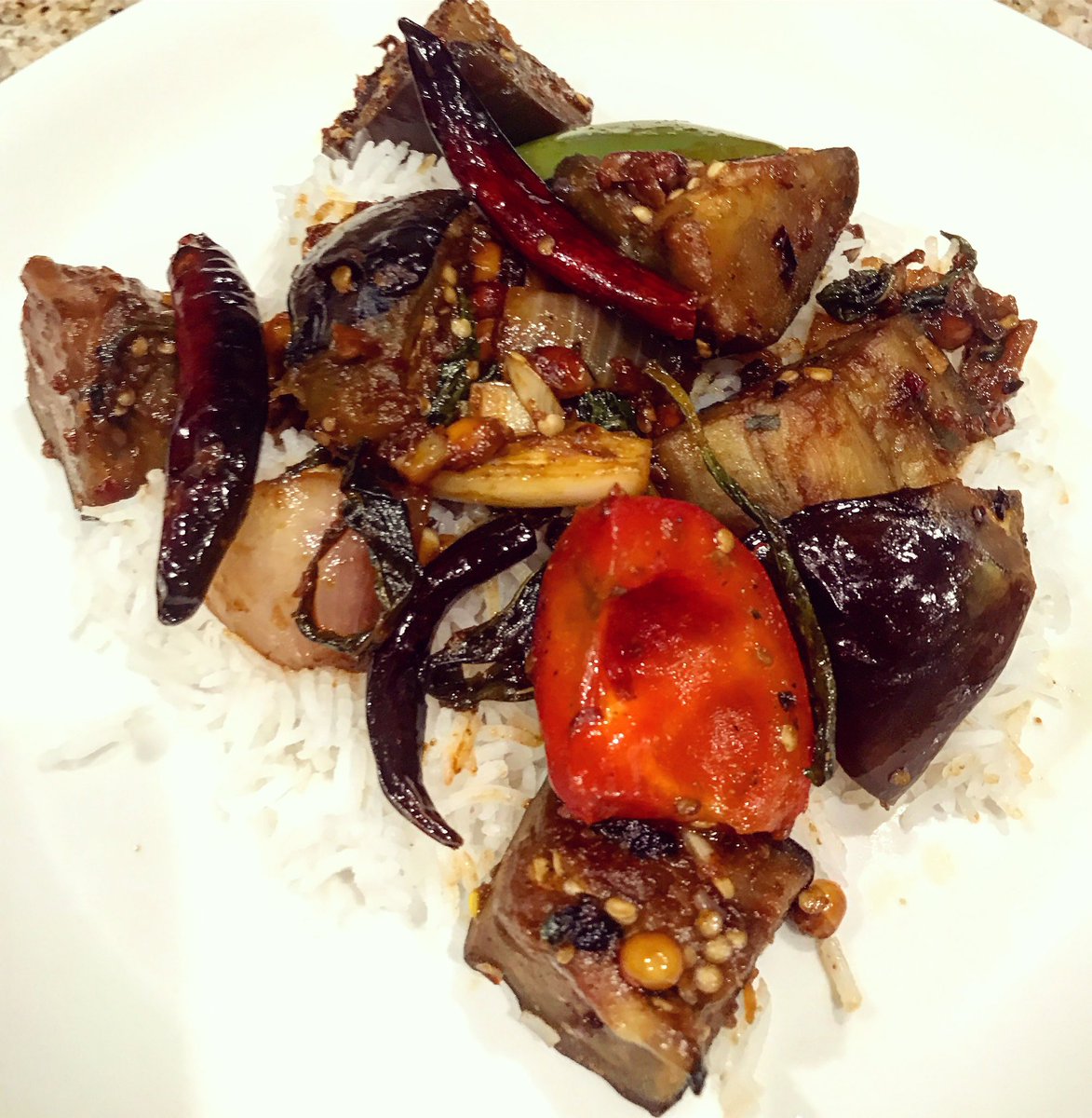 NepaliTummy's tweet photo. Basil Eggplant with Steamed Rice👏#eggplant#curry#basil#rice#homemade#healthyfood#foodie#foodblogger https://t.co/fEGQH27q5S