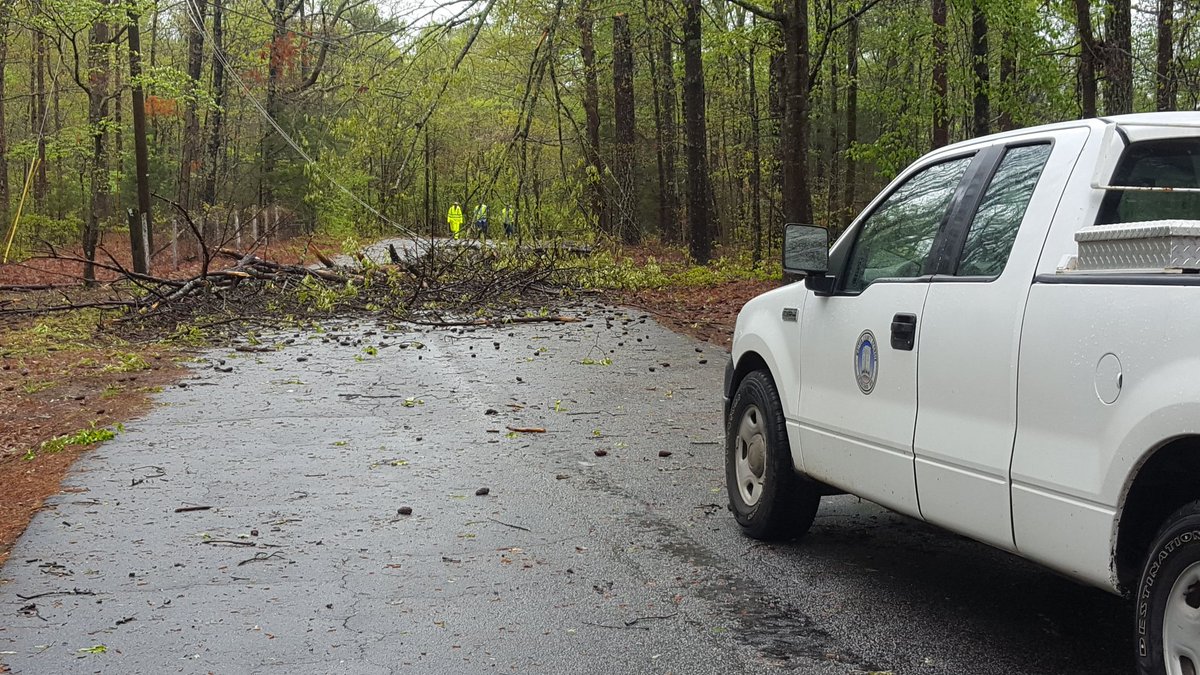 Fox5Juan's tweet photo. A tree is blocking the road, stopping officials to get to homes with trees in them. Watch @ChristyReport &amp; #fox5atl for all your local news https://t.co/dApgQpevxg