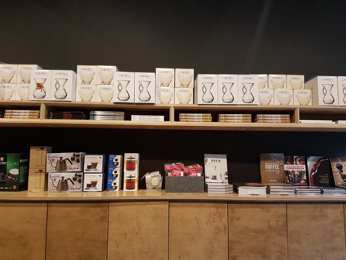 javamarked's tweet image. A wall of knowledge at cafe #7 in the #8cafeday @revolver_coffee has a great vibe for sipping, chatting and working 💼