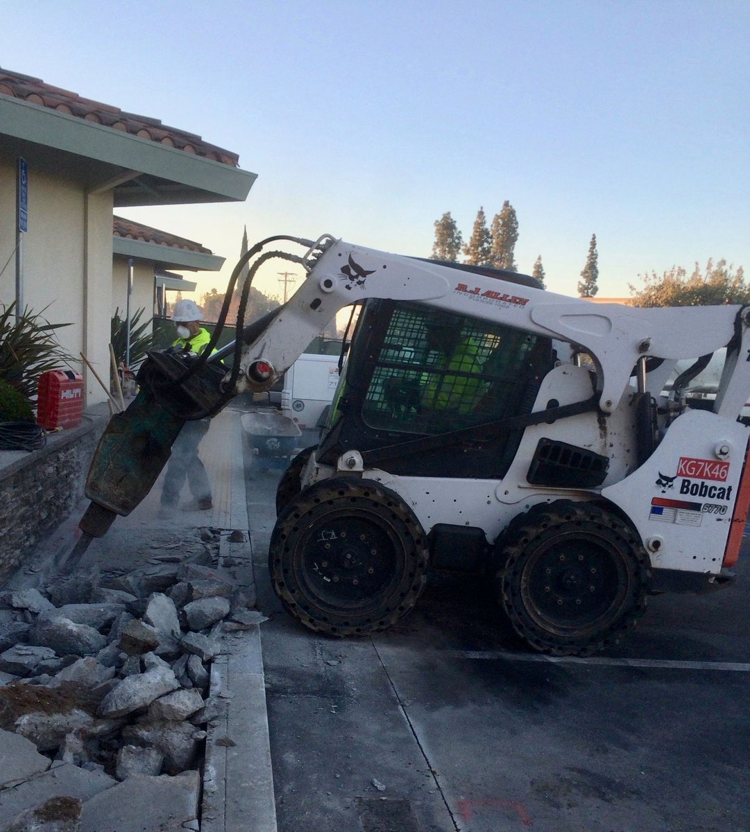 Breaking #concrete- very carefully! #jobsite #demolition #heavyequipment #bobcat #rjalleninc