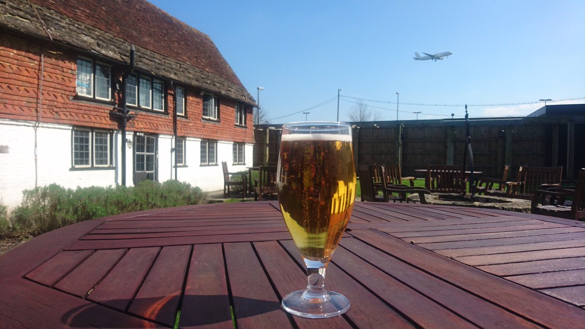 Come and enjoy this sunny day with local Bedlam Pilsner in our courtyard! #Gatwick #Bedlam