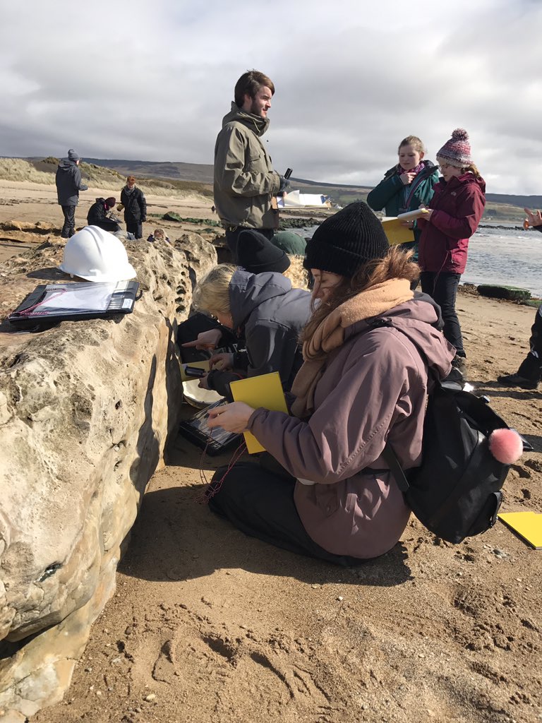 Geology_Helen's tweet photo. Measuring #crossbeds in #sandstone #geology #fieldwork #Arran @UofGGES @UofGSciEng @IsleofArran1 https://t.co/kHe6h85q08