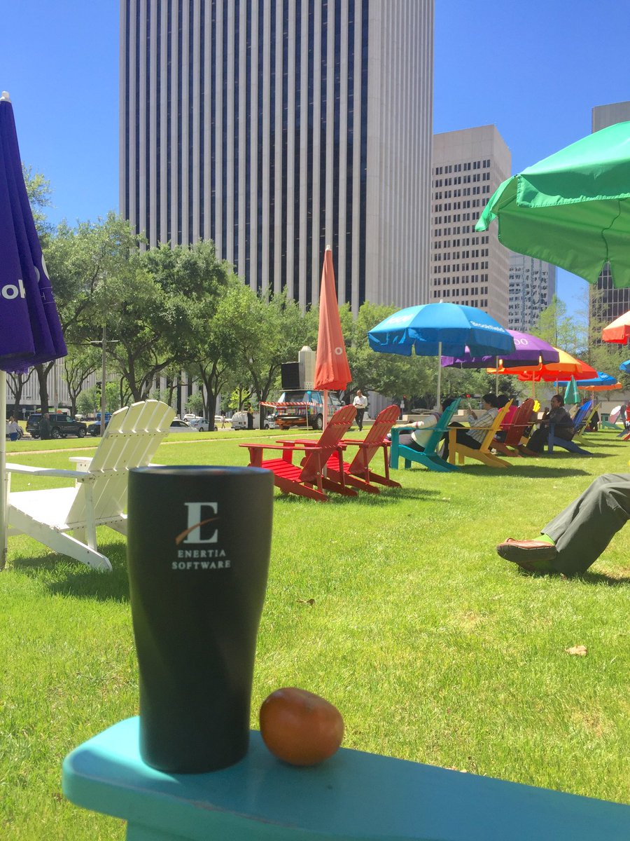 It's a gorgeous day!   Getting my vitamin D and enjoying a cold drink in my <a href="/EnertiaSoftware/">Enertia Software</a> cup