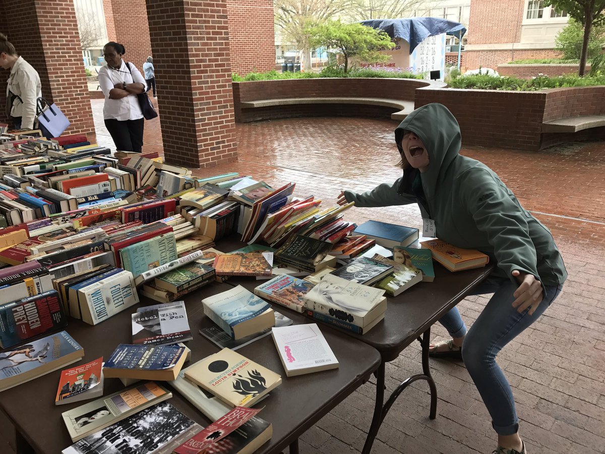 scalaUNC's tweet image. Rain or shine our president is here to protect the books! $5 fill a bag sale going on until 5. LAST DAY!!!! #unc #uncsils