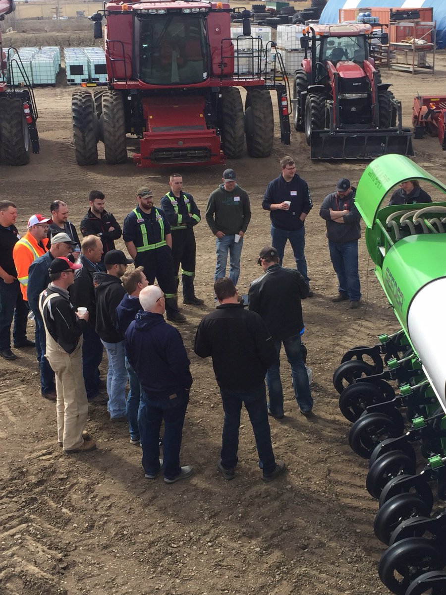 SmartSeeder's tweet photo. The @RMEHQ team learning that calibrating one #smartseeder assembly sets up the entire drill for success - #plant17 #westcdnag #seedsync https://t.co/x1NbcxBo15