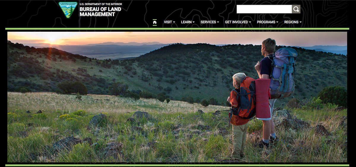 NRDC's tweet image. The @Interior Dept just changed its website homepage from a photo of a family enjoying the outdoors to a giant pile of coal. Real subtle.