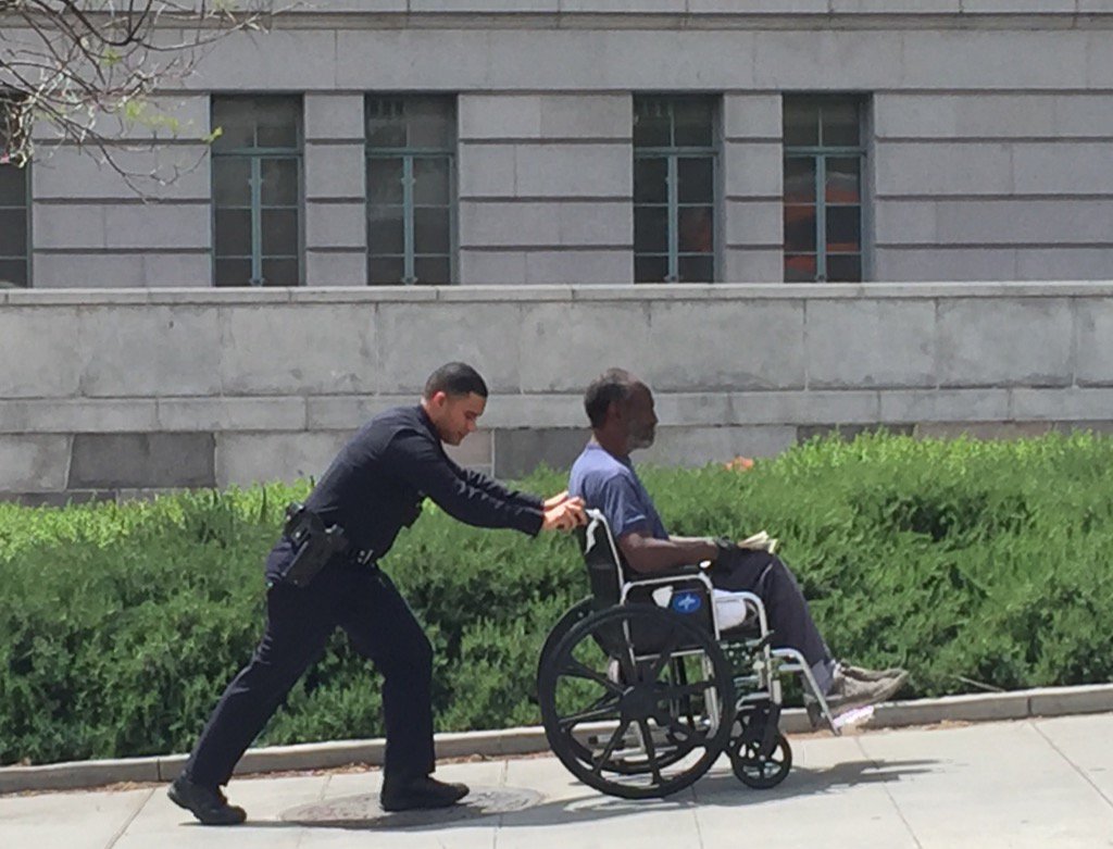 Just saw this #LAPD (I think) officer pushing a man up a hill in #DTLA. #nice