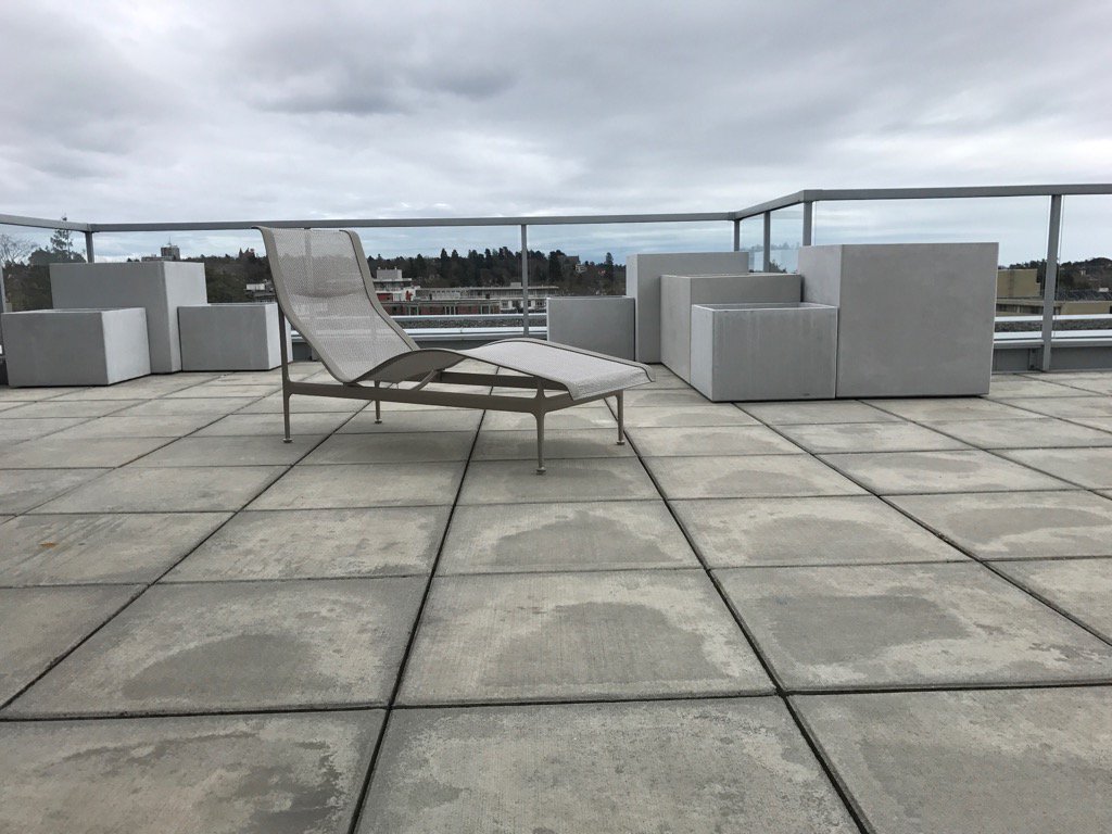 landscapecanada's tweet photo. Our REC UHPC series looking great on this rooftop deck. https://t.co/KZAINB3H8b
