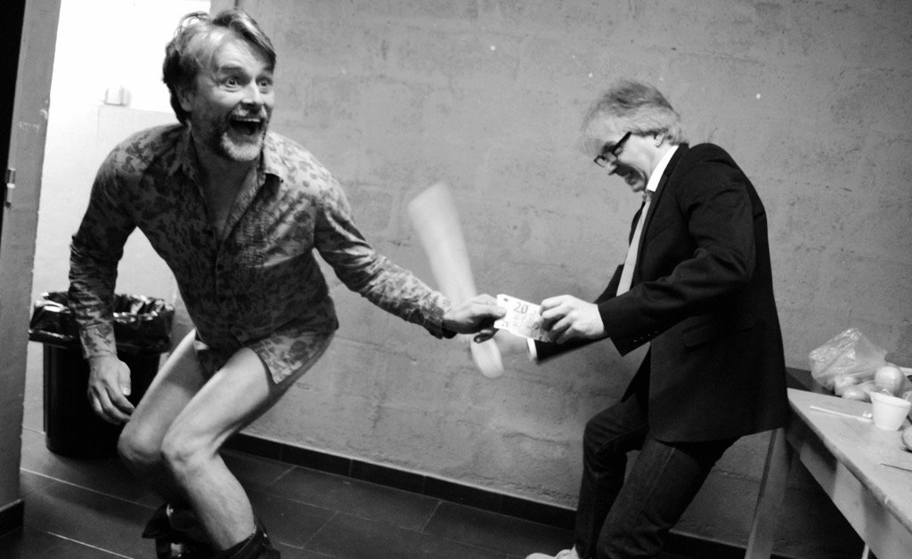 A rare and collectible pic of PW being hit on the arse with a baguette for 20 euros. <a href="/theTHband/">The TH Band</a> <a href="/TheTonyHadley/">Tony Hadley</a>