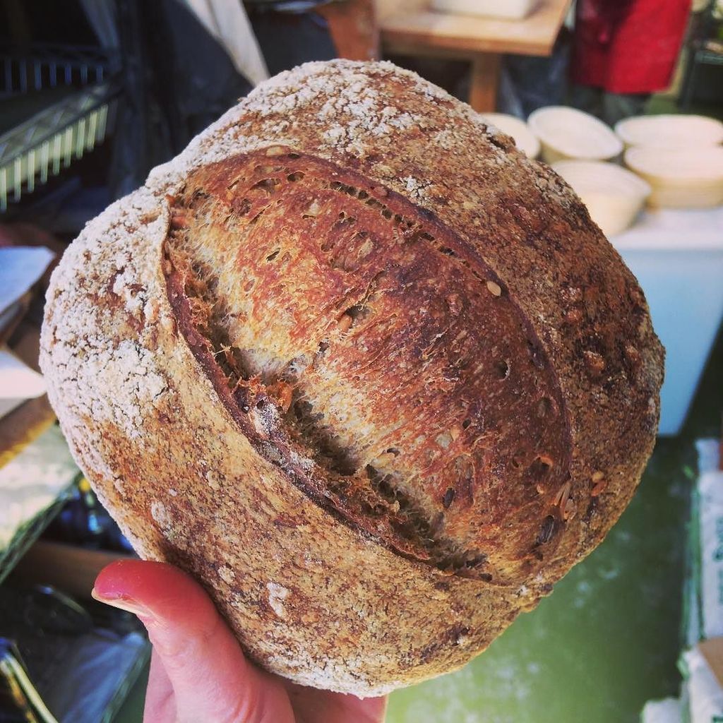 whitepostbakery's tweet photo. Malthouse with sunflower seeds #stoneground #sourdough #woodfired https://t.co/0P2oElTbwJ https://t.co/Luzfg3rptj