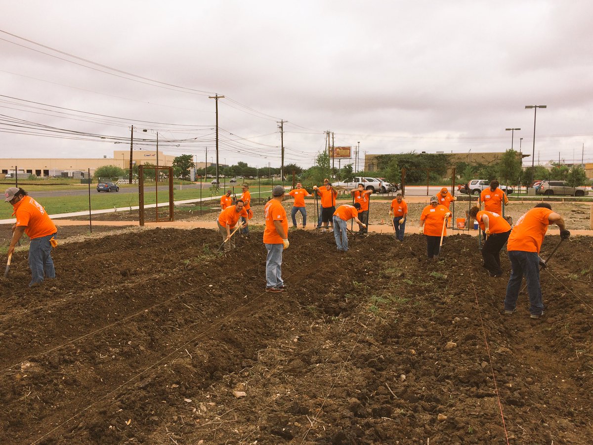 ChristinaTHD's tweet photo. Go 6542 hard at work #foodbank ATX creating the foundation of a garden #giving back https://t.co/slD0JuVv4A