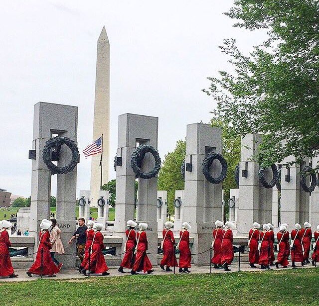 TAA_PR's tweet photo. Creepy but brilliant marketing by @hulu in the city today for their new show Handmaid's Tale https://t.co/rzWEHb5yY9