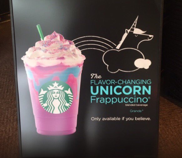 Vonster's tweet image. Check out this Starbucks signage with a unicorn graphic? WTH?