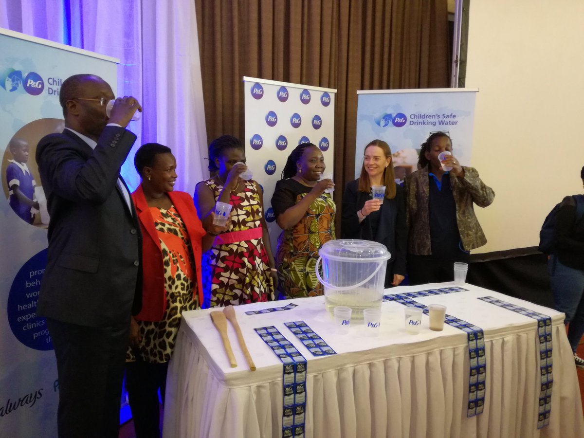 fgkyaka's tweet photo. Dr. Dorothy Balaba, ED at PACE Uganda with other members drinking the safe water purified by P&G sachets. #PACE Uganda , #Thepowerofclean https://t.co/imCARRL3WF