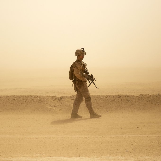 Dust in the Wind. a machine gunner with the , patrols through a sand storm ...