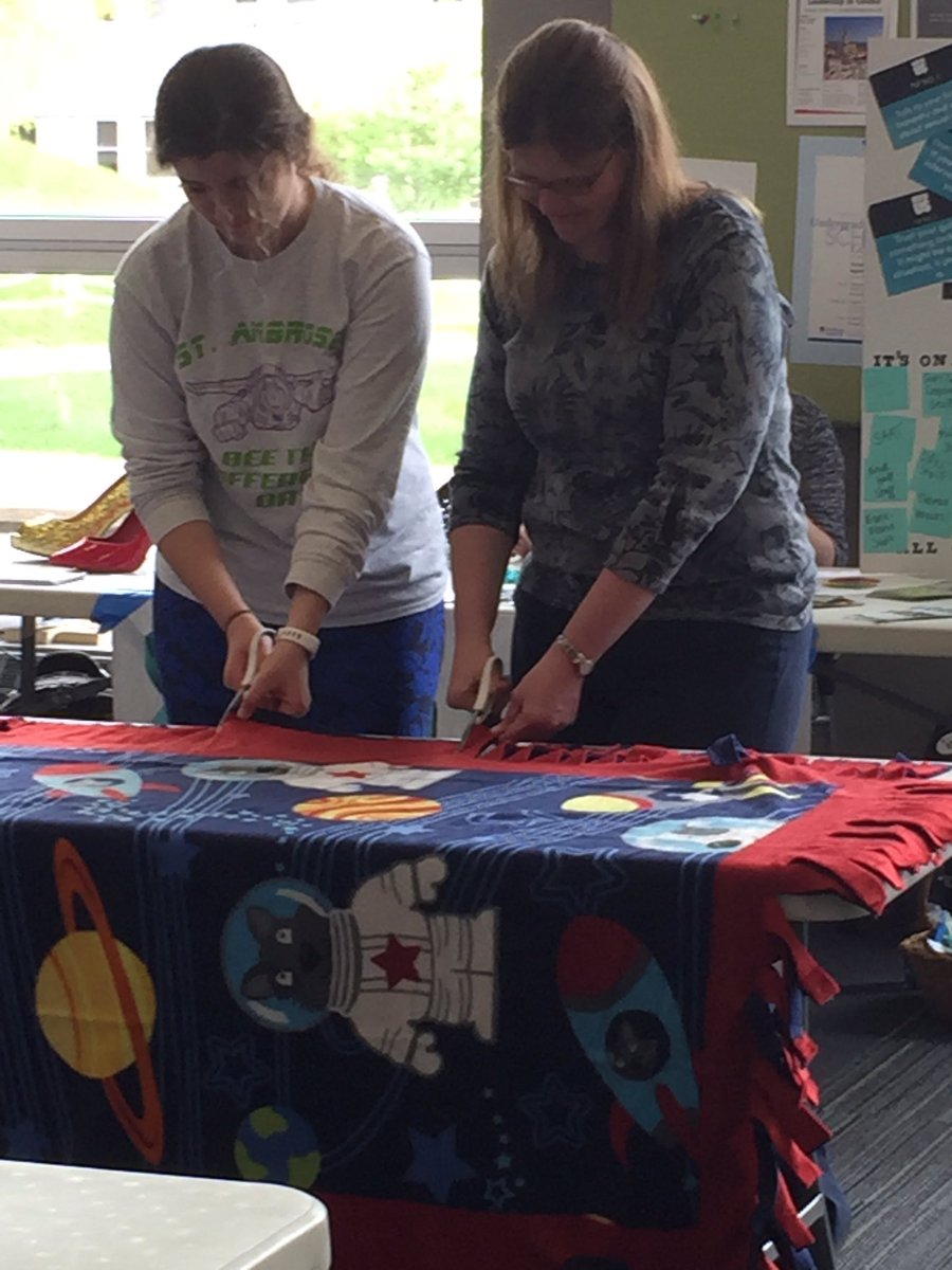 Making blankets for Cover2Cover at the Mission Fair! #SAUmission2017