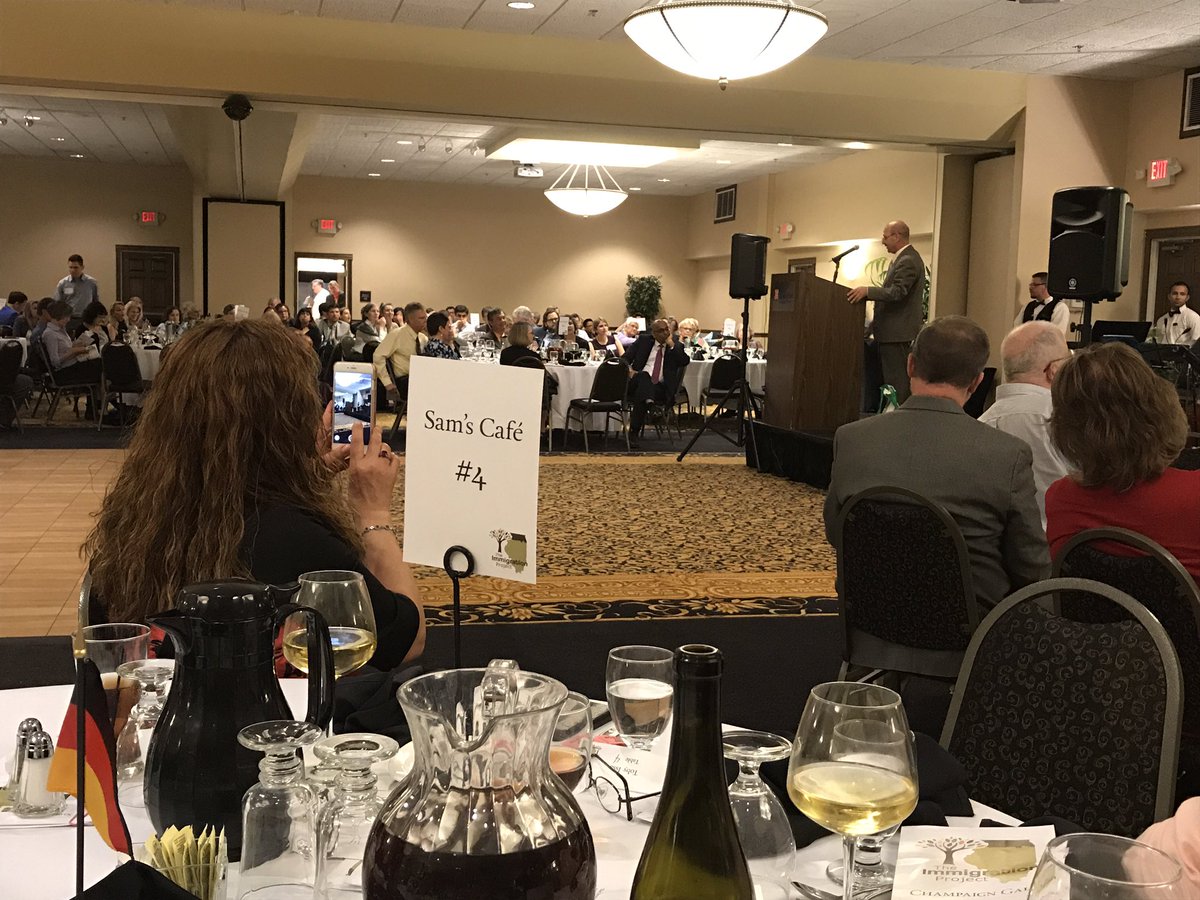 ekellner's tweet photo. @TheImmProj gala.  Sam of Sams Cafe telling his story. It doesn't matter where you are from. You belong here. https://t.co/6V1YTzffeu