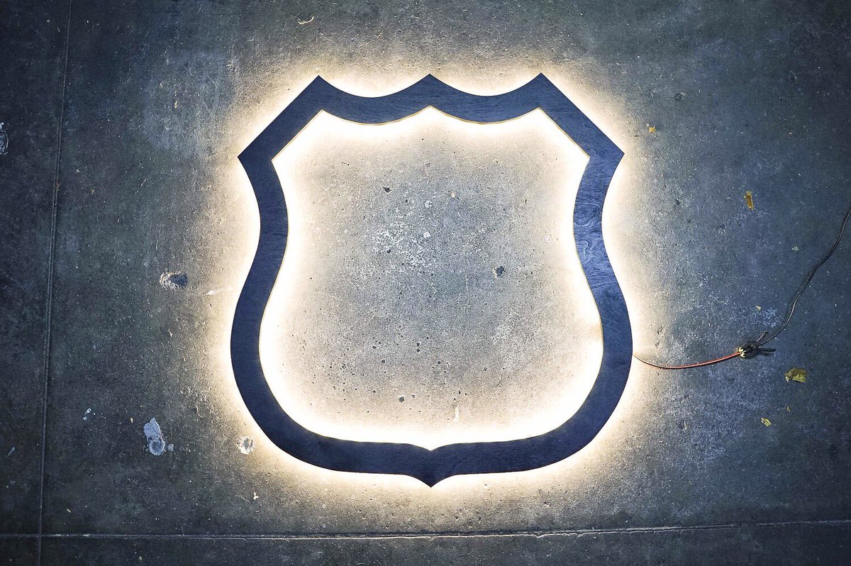 Glow, little one. GLOW! We're loving this part of a much larger sign for @WiretapSecurity.