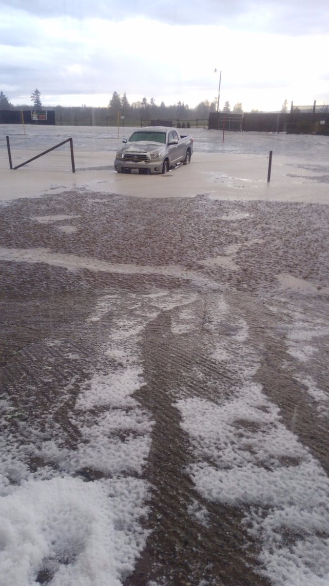 My Farm truck in a pond of hail and water.  When will this rain ever stop?  #carletonfarms  #rain