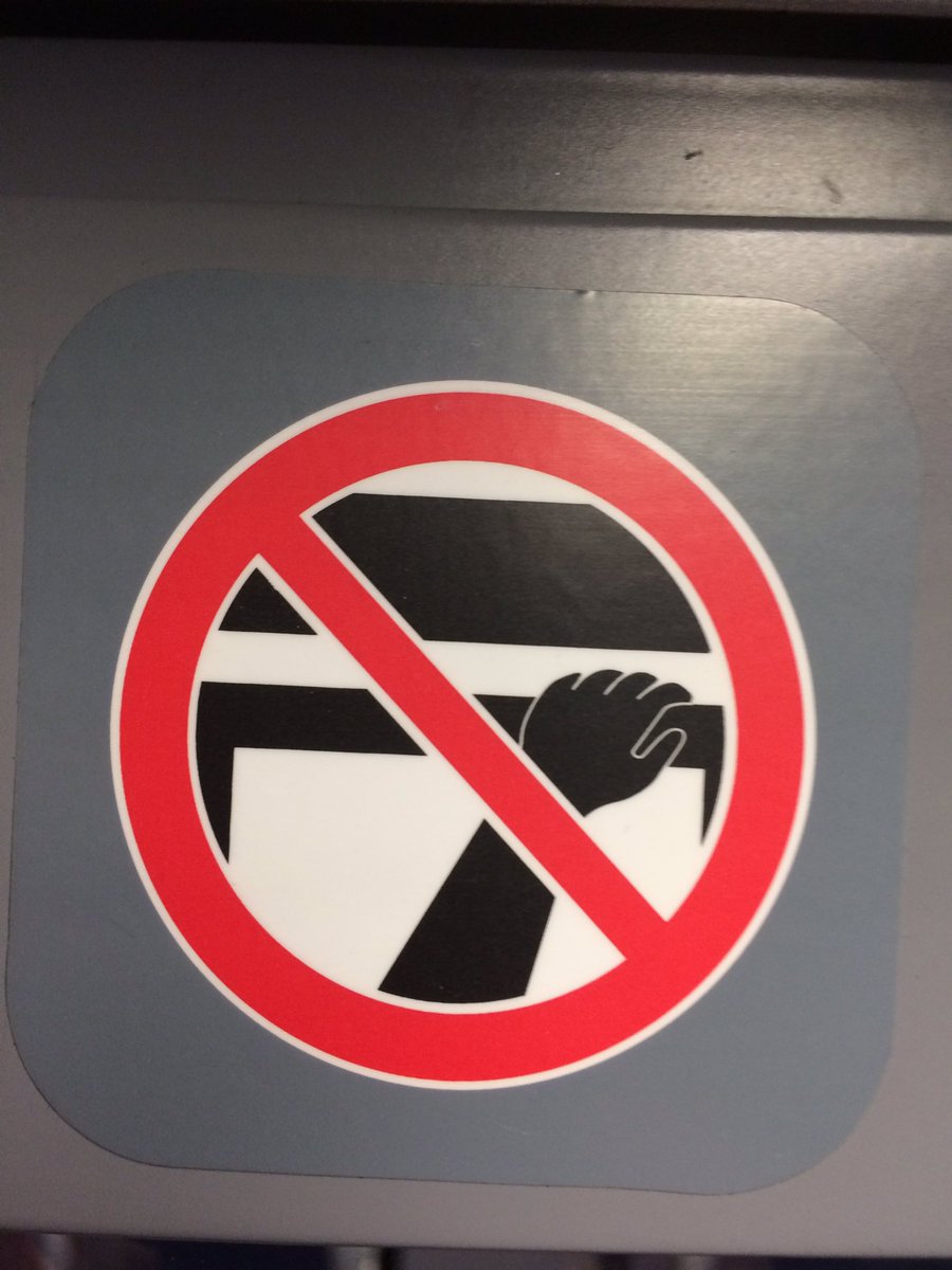 SimonLederman's tweet photo. Dear @TLRailUK Could you tell me what this sign is telling me not to do? I'll be happy to comply I just hope I'm not already doing it. https://t.co/IZcP61JEw3