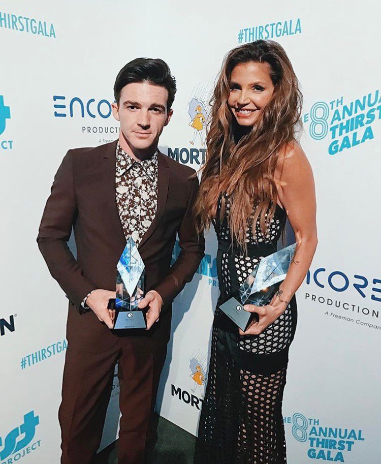 The beautiful <a href="/AllCharisma/">charisma carpenter</a> with <a href="/DrakeBell/">DrakeBell.ethᵍᵐ</a> at the <a href="/thirstproject/">Thirst Project</a> gala #BtVS
