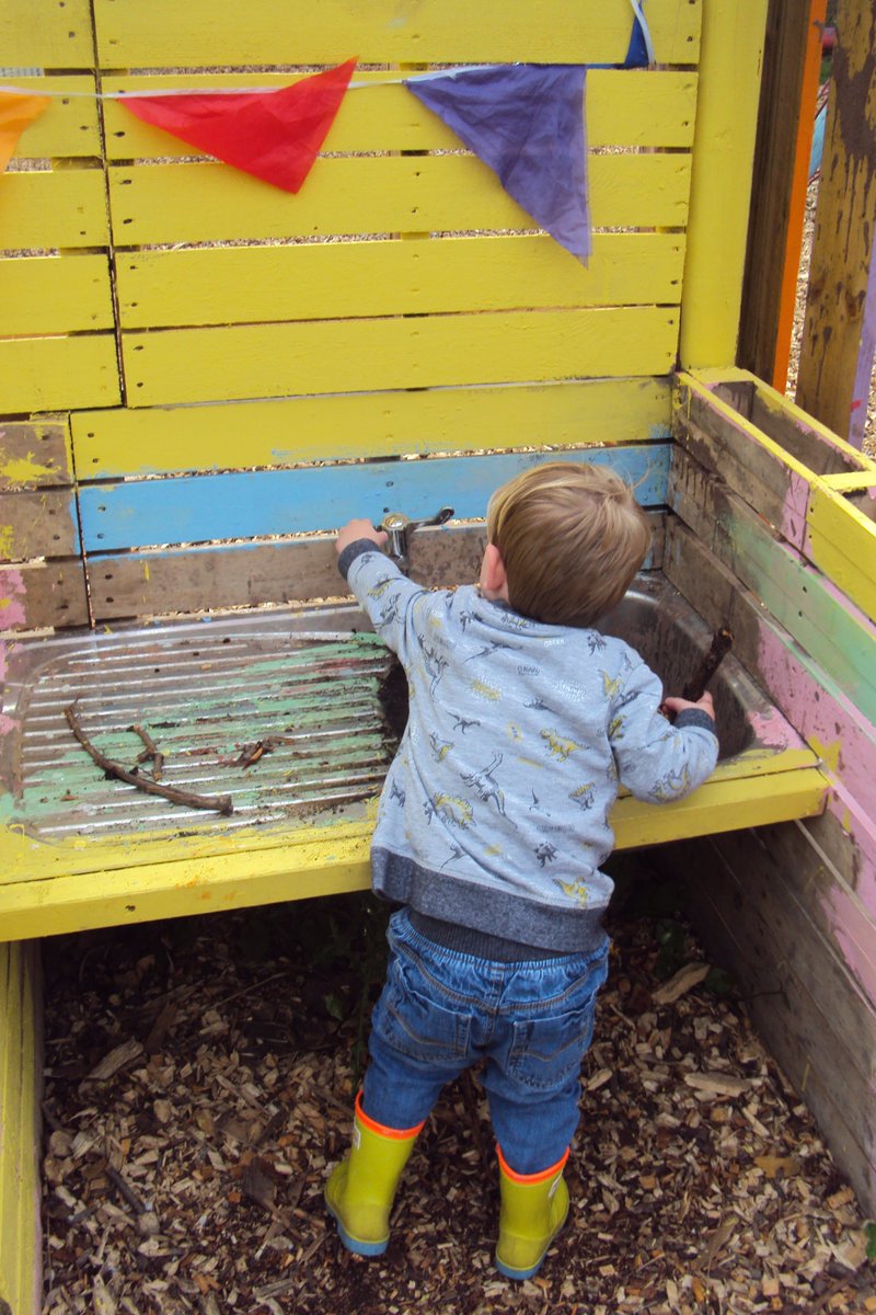Climbing trees, digging for ingredients and cooking up a storm in the mud kitchen at Wild Tots! #nature #getoutside #play