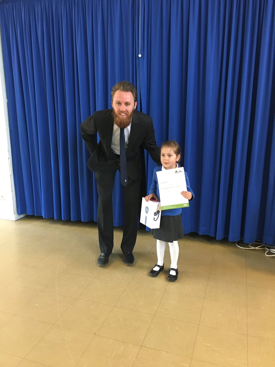 One of our #STEM Ambassadors presenting Lucy Slasor with a certificate and prize for winning The ICE prize draw at The Big Bang event.