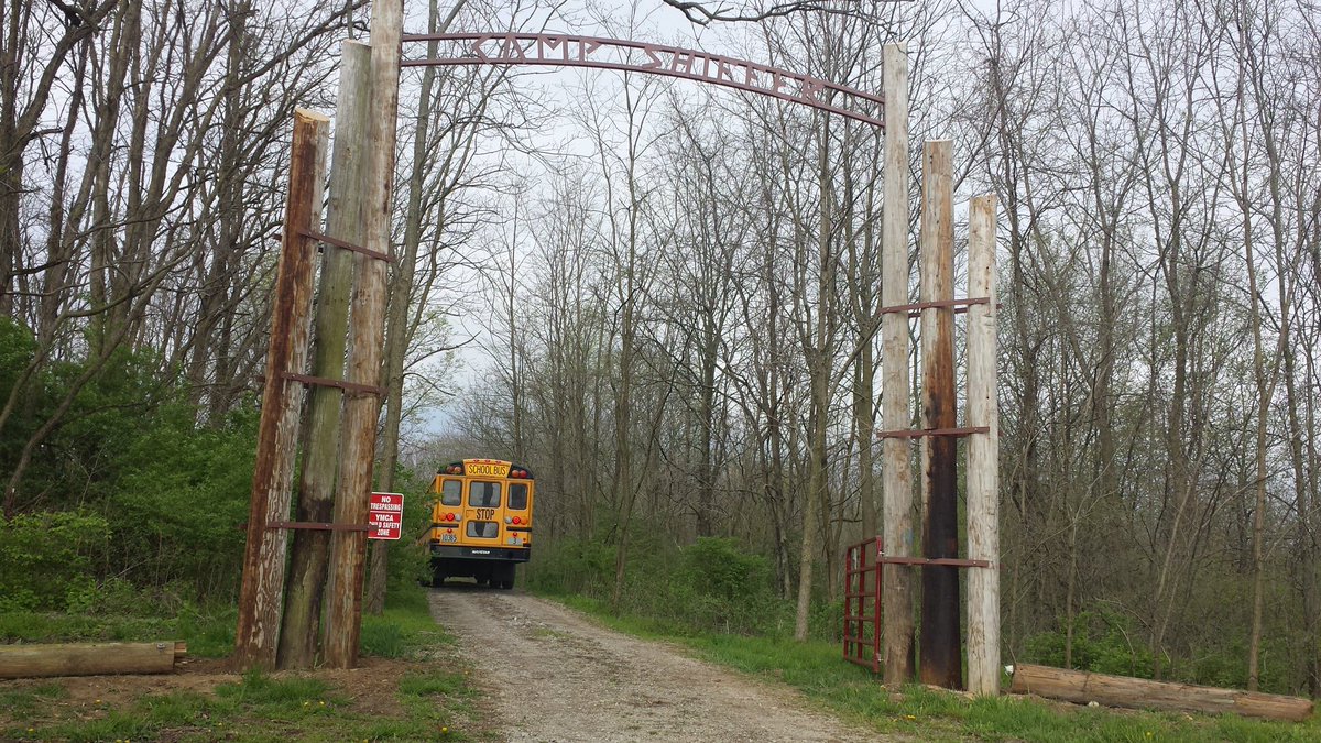 Busses arriving at YMCA Camp Shiffer for 3rd annual Earth Day with   700+ Champaign Co. 2nd graders!