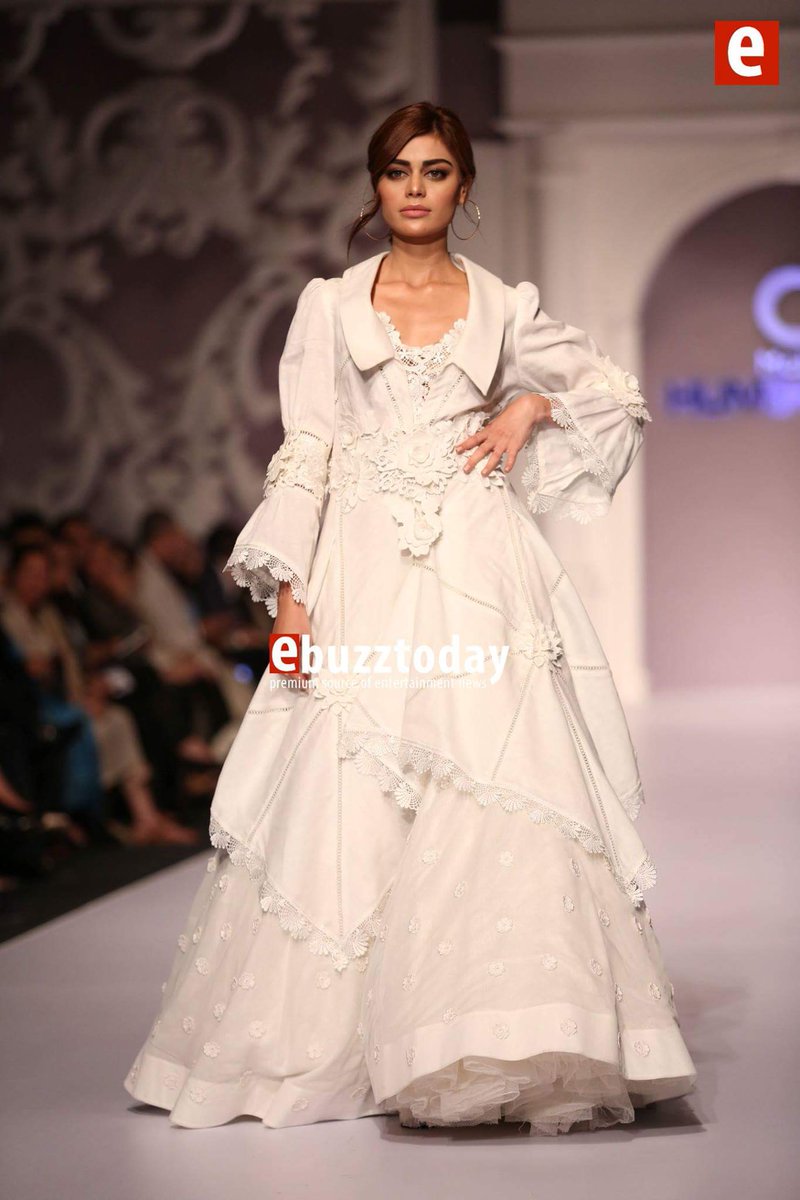 ebuzztoday's tweet photo. @thesadafkanwal walking up the ramp wearing @RizwanBeyg #ebuzzshowcase #ebuzztoday #QHshowcase https://t.co/Bt8Fsedrim