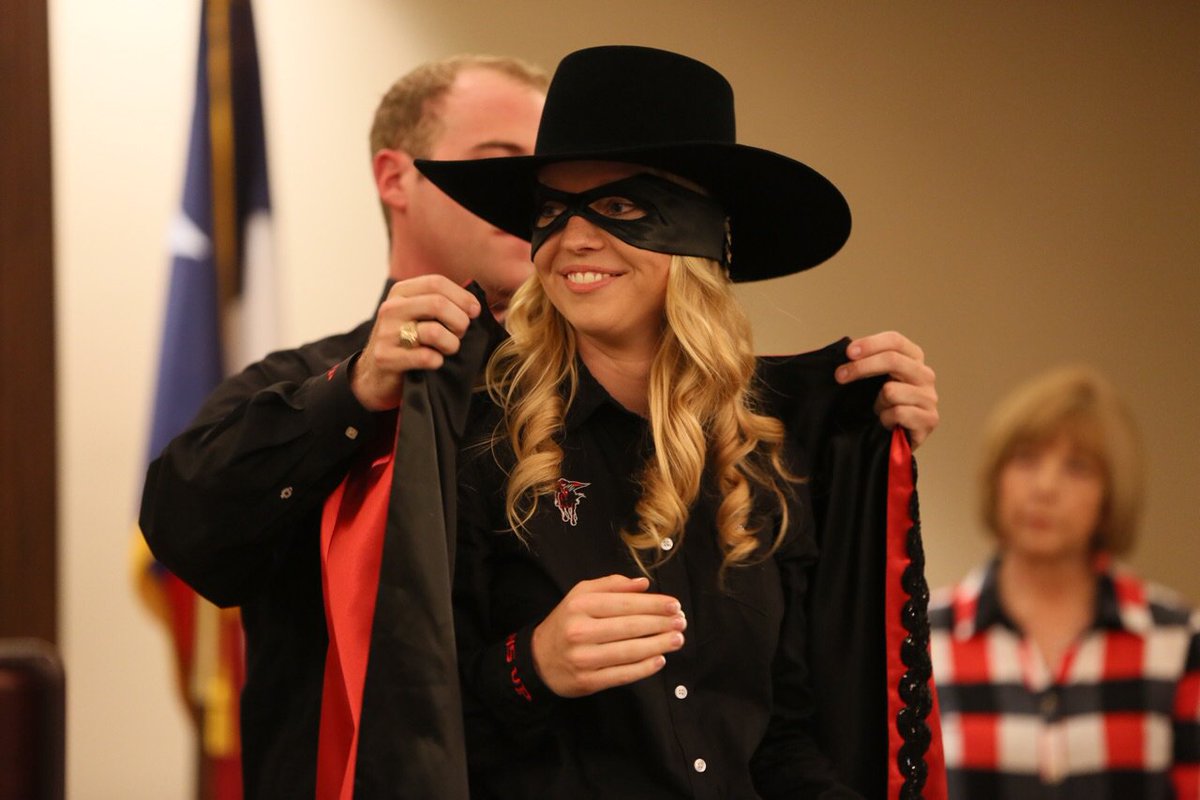 TexasTech's tweet photo. 2017-2018 Masked Rider Laurie Tolboom dons the iconic mask, bolero hat and cape of her new role. #IAmARedRaider https://t.co/WbzY94kkWC