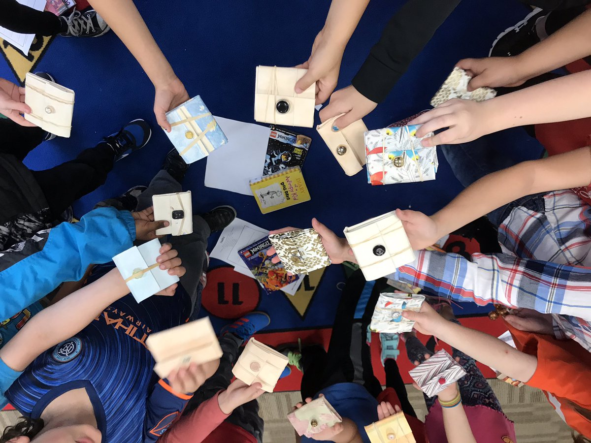 patriciaeyer's tweet photo. @WOSnews #mrscassettiWOS ♻️by making wallets from broth boxes &amp; wallpaper &amp; old buttons #earthday2017 #libraryWOS https://t.co/N6MosJb31O