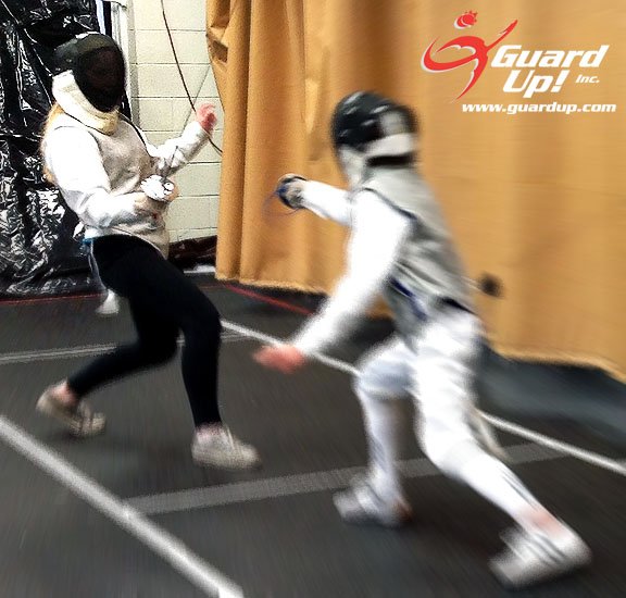 GuardUp's tweet image. #FoilFencers Ian and Fiona practice their #ripostes in a #bout. Join them in a free #advanced #fencing class: goo.gl/9DQKCe