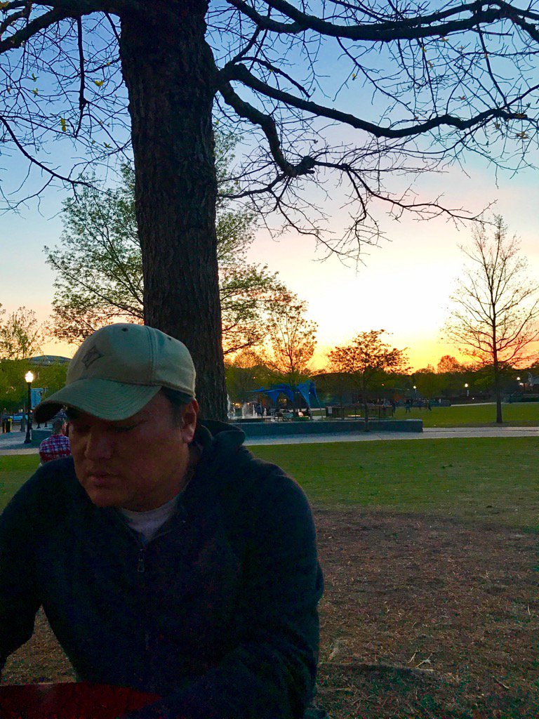 chrisrickwood's tweet photo. As the sun sets behind me I am contemplating my tiny existence in this universe.  #jk. #checkingfacebook https://t.co/VNp3tS9FS6