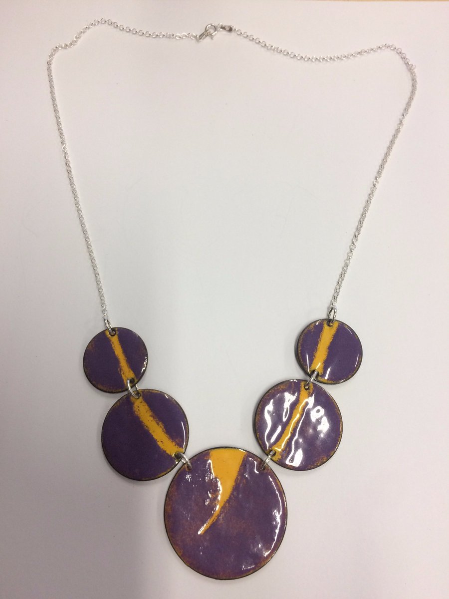 Editor_Clark's tweet photo. I became a silversmith of sorts for a day at #WorkingSilver! So I created an enamelled necklace in honour of the Oxford comma. https://t.co/C9AVp2KoUi