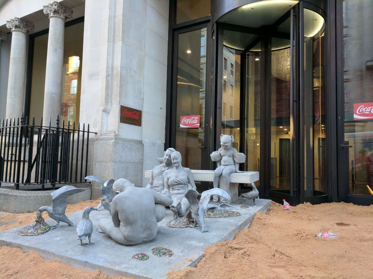 GreenpeaceUK's tweet photo. The artwork we just put at @CocaCola_GB HQ is the work of renowned sculptor @JasondeCairesT

#EndOceanPlastics #Plasticide https://t.co/sV93OgJYMF