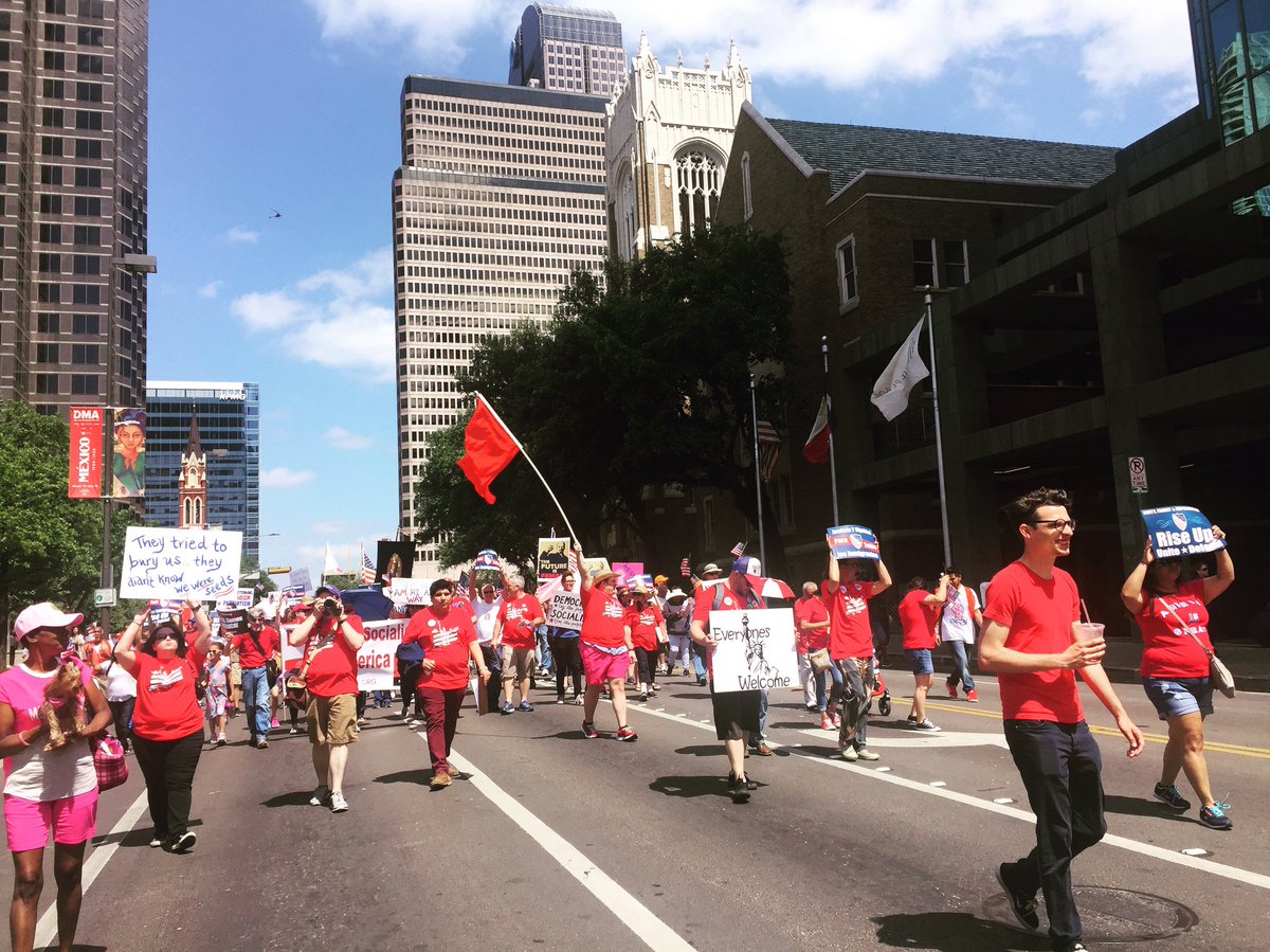 DSAFortWorth's tweet photo. DSA all in red for the #dallasmegamarch2017 - 🌹 #DSA https://t.co/75USR6u3Kr