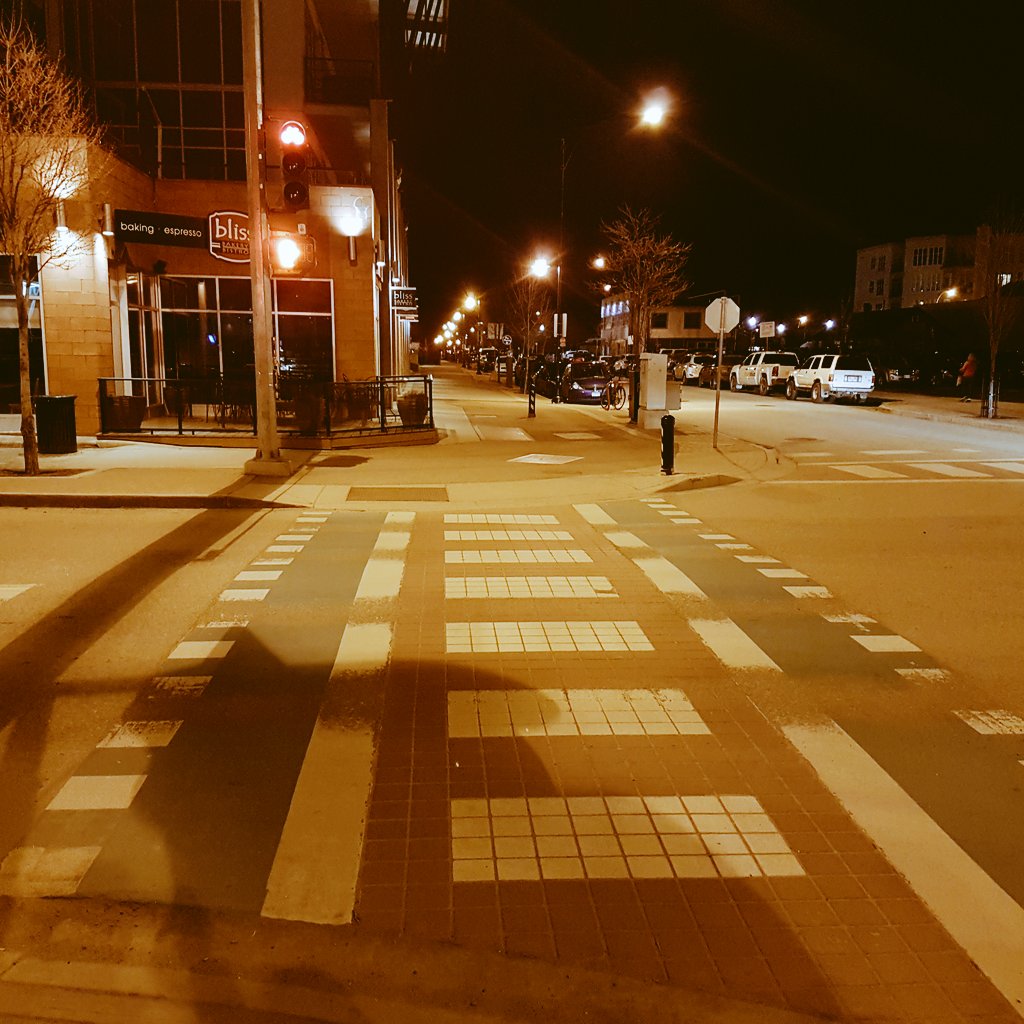 TM9563's tweet photo. In #kelowna this weekend and came across this cool urban multi-use trail crossing, complete with #bikesignals & #elephantsfeet https://t.co/qjTtm1x0Bk