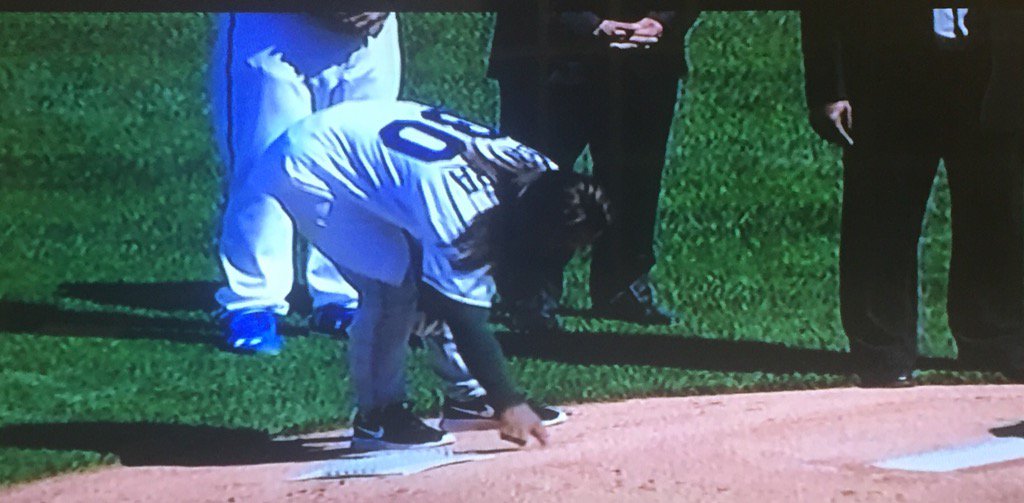 jeff_rosen88's tweet photo. Yordano's mom draws the word "Dios," God in Spanish in the dirt behind the pitcher's mound where Yo threw fire. https://t.co/4VsDTdTEoO