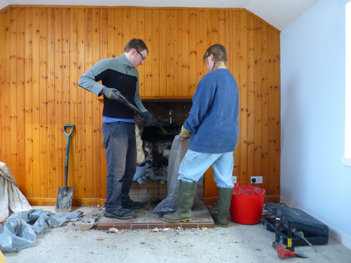 UistCottages's tweet photo. Day 2 of #FireplaceFun and we have managed to get back to the bare stone. A lot of cleaning to do next! #DIY #Uist #LogBurner #WhatATeam https://t.co/ocIQKgfsYF