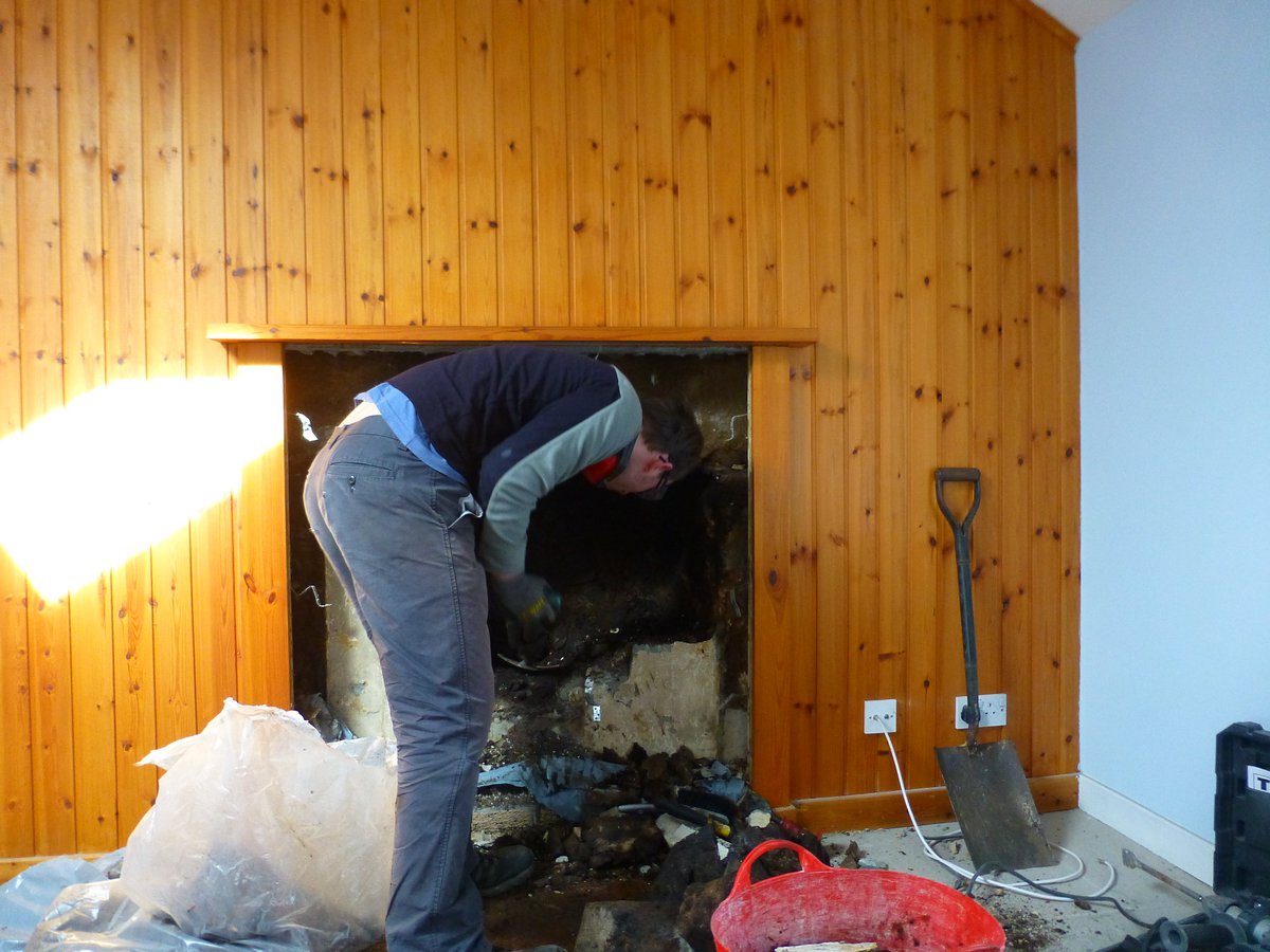 UistCottages's tweet photo. Day 2 of #FireplaceFun and we have managed to get back to the bare stone. A lot of cleaning to do next! #DIY #Uist #LogBurner #WhatATeam https://t.co/ocIQKgfsYF