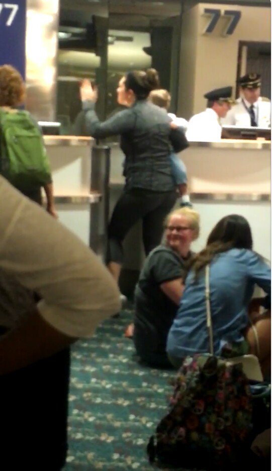 chouseoes's tweet photo. Medical.emergency, no concern, others stepping over her to fight. No crew, pilots missing - weather ?
#deltameltdown ,#deltadisaster #Delta https://t.co/RjR9zB2fHO